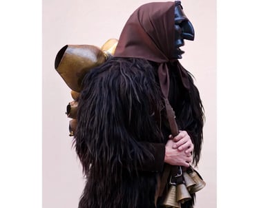 Mamuthones mask and costume from Mamoiada, traditional Sardinian carnival figure with bells
