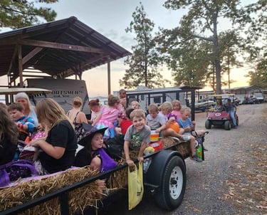 kids in halloween costumes on a hayride