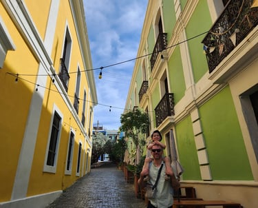 the candidate and his son in Old San Juan