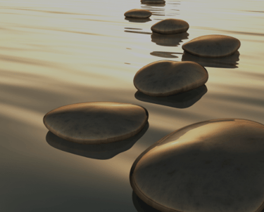 a group of stones with a line of stepping stones