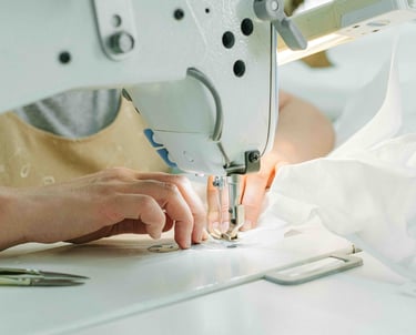 apparel manufacturing, stitching, machines, clothes