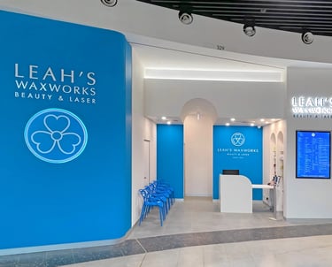 Beauty and Laser salon's shopfront, with main logo, pricing display, product display, reception and waiting areas.