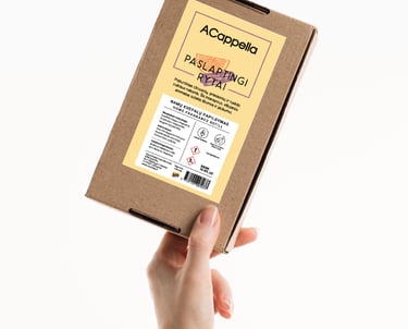 hand holding craft box with colored home scent label