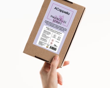 hand holding craft box with colored home scent label