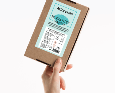 hand holding craft box with colored label