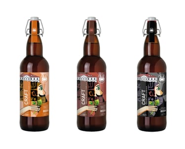 three bottle of craft beer with labels