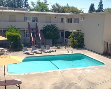 pool and patio at university commons apartments davis california