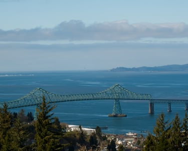 Astoria, Oregon overlooking water with bridge
