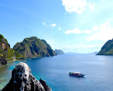 Palawan Beach with boat and peaks