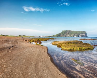Jeju Island overlooking water and rocks