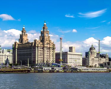 Liverpool waterfront wit buildings and amusement rides