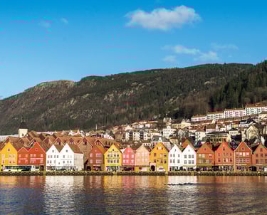 bergan Norway buildings Infront of water with mountain backdrop
