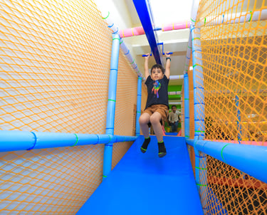 Boy having fun in play zone.
