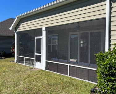 Back porch with Aluminum system screened in porch enclosure.