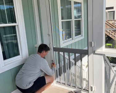 New screen door installation on a beachfront property in Georgetown County.
