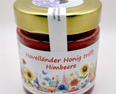 Honig mit Himbeeren