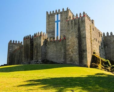 a castle like structure with a cross on the top of it