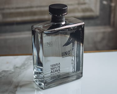 a bottle of Tequila Uno Cristalino - premium tequila cristalino