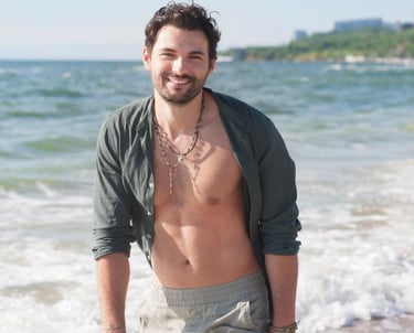 a sugar baby with a beard and a shirtless shirt