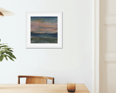 a table with a vase and a vase with a plant in it