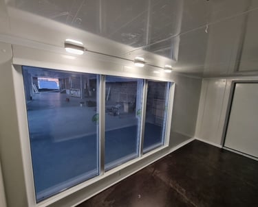 A glass cold room with insulated windows