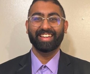 Headshot picture of Dr. Arvind Ramakrishnan in a black blazer. 