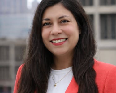 Headshot picture of Dr. Elizabeth Cambray-Engstrom in a red blazer