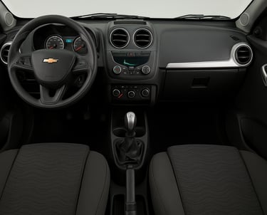 Interior do Chevrolet Agile com painel, volante e console central vistos de frente.
