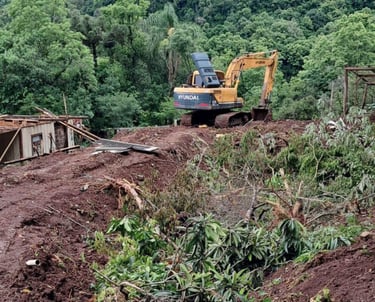 a construction worker is working on a hill top