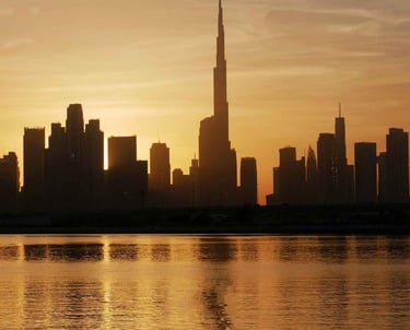 Dubai skyline with Burj Khalifa at sunset, symbolizing real estate consulting and investment strategy in the UAE.