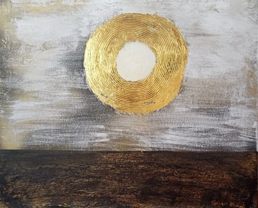 Abstract mixed media painting featuring a textured gold circle over a neutral grey and brown landscape.