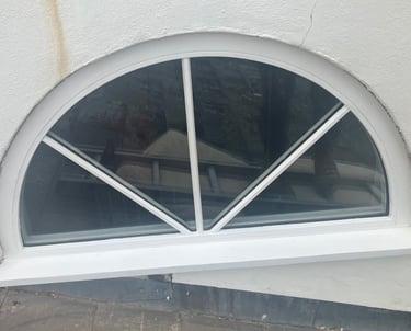 curved wooden window