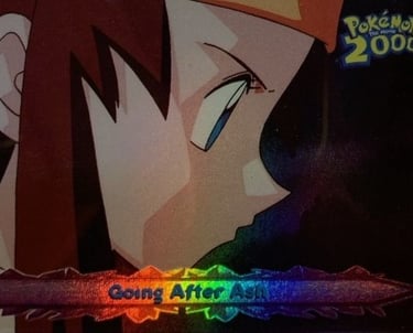 28 Going After Ash Topps Pokémon The Movie 2000 rainbow foil