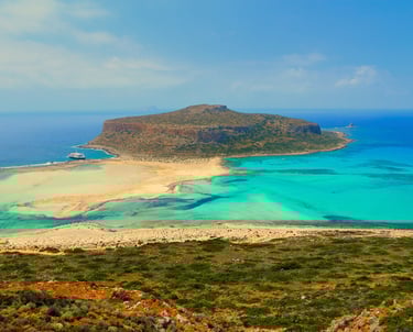 a beach with a boat in the water