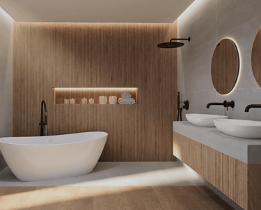 Modern luxury bathroom with freestanding bathtub, wood slat walls, and dual vessel sinks with round mirrors.