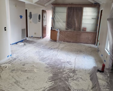 Removing popcorn ceilings. It's a messy business.