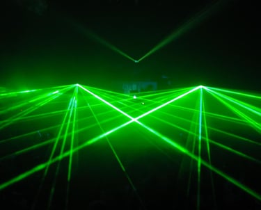 Green lasers at a large rave show laser laser laser laser laser laser