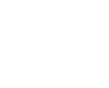 a man in a suit and tie is holding a camera