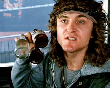 a man with a hat and a beer glass