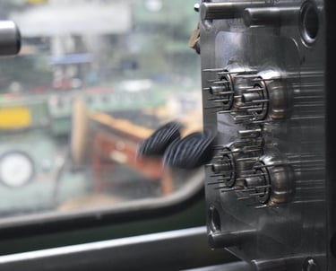 interior of a mold for injection molding ejecting the completed parts