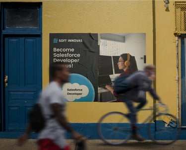 a man riding a bicycle in front of a building