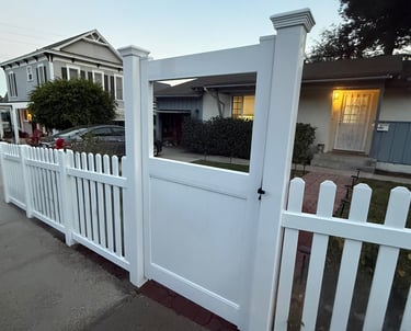 Custom white picket fence and gate