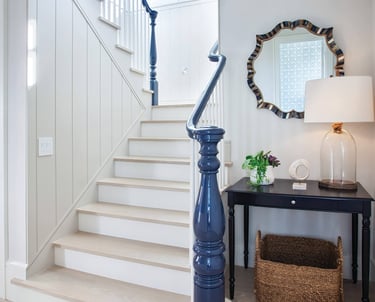 a staircase way with a lamp and a lamp
