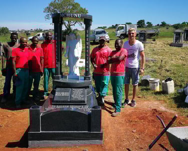 The Tegg's team with a custom memorial manufactured by TGM
