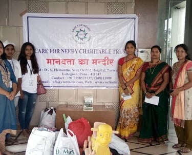 a group of women standing around with bags of food