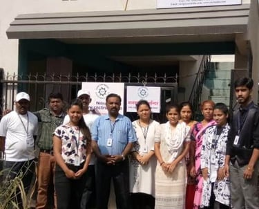 a group of people standing in front of a building