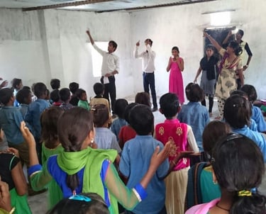 a group of people standing around a room