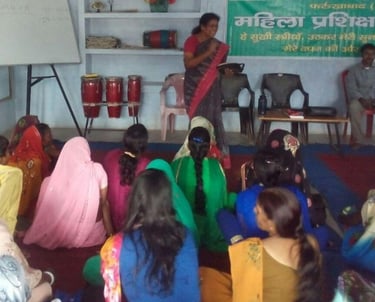 a group of people sitting in a room