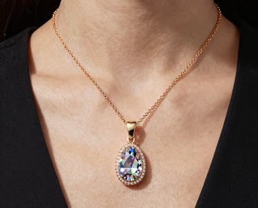 woman in black blazer with brown hair