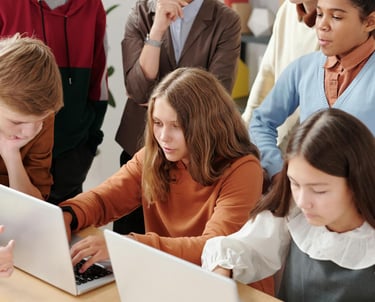 STUDENTS IN CLASSROOM WITH ONLINE TUTOR 